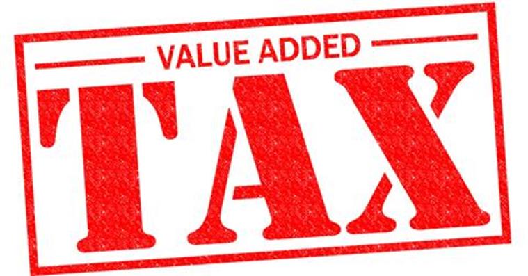 VALUE ADDED TAX red Rubber Stamp over a white background.